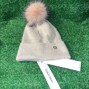 CALVIN KLEIN Cream with Sparkle Highlights Gold Logo Badge Pom Beanie MSRP $48